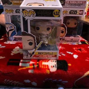 Funko Star Wars Rey with yellow lightsaber